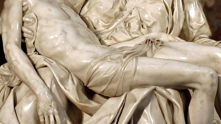 Close up of Michelangelo's famous Pieta focusing on the muscle and bone beneath the surface. Apply this concept to your spec script!